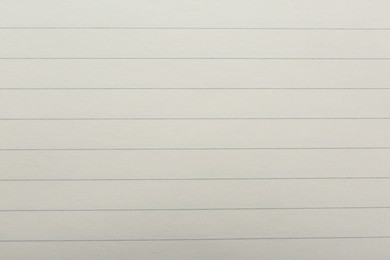 Photo of Lined notebook sheet as background, top view