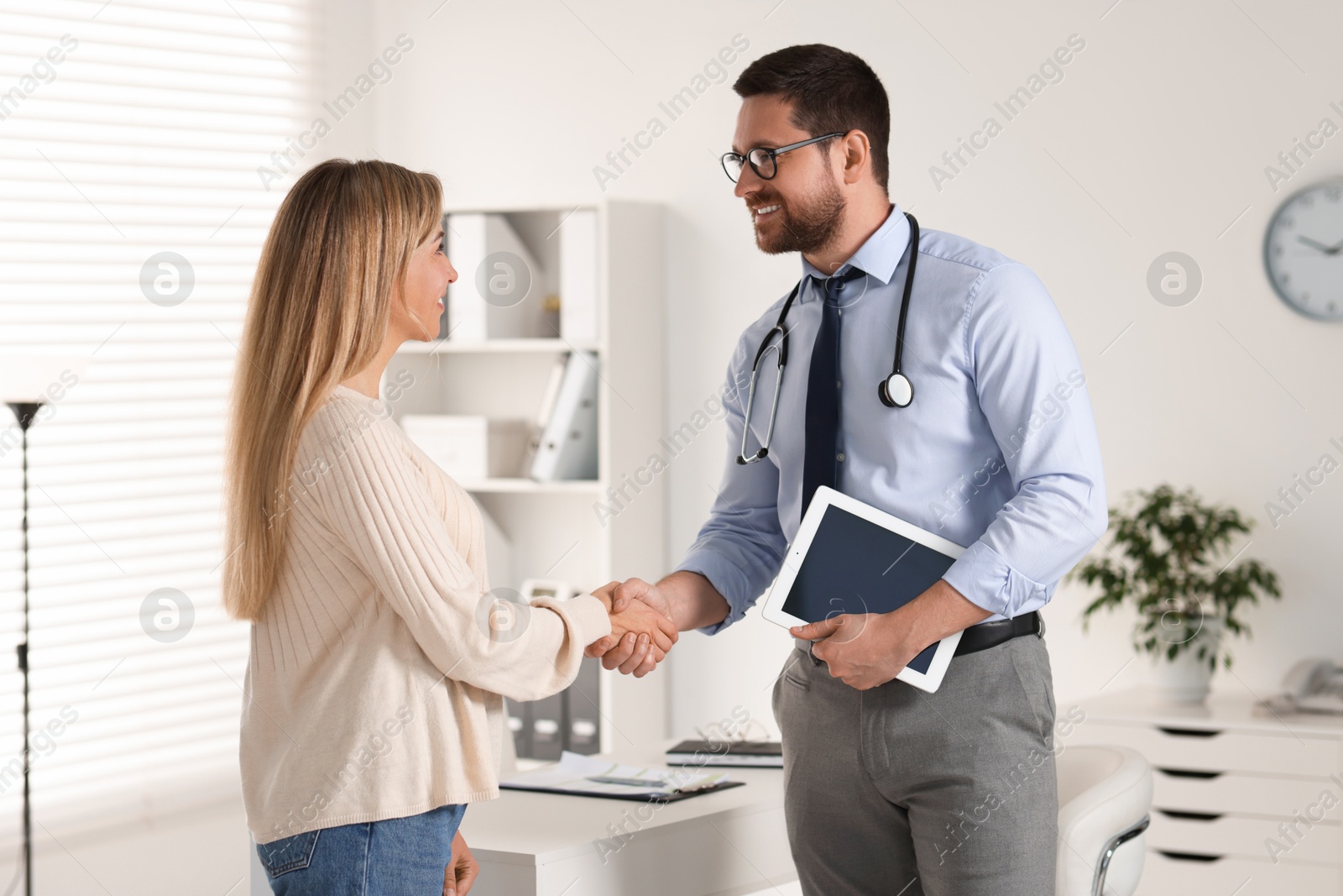 Photo of Professional doctor working with patient in hospital