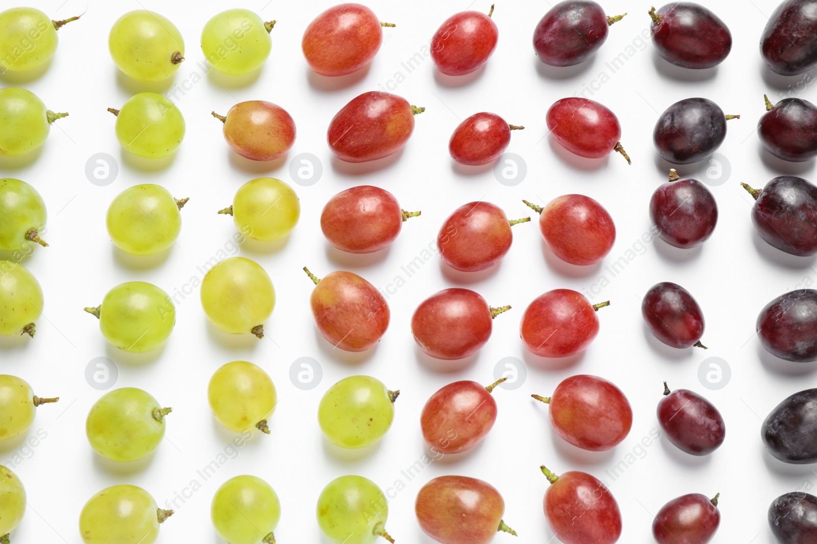 Photo of Fresh ripe juicy grapes on white background, top view