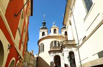 PRAGUE, CZECH REPUBLIC - APRIL 25, 2019: Beautiful view of Clementinum Library on city street