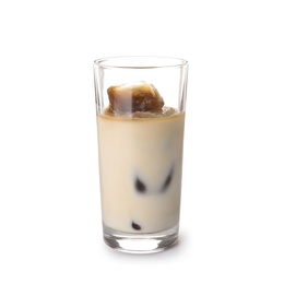 Glass of milk with coffee ice cubes on white background