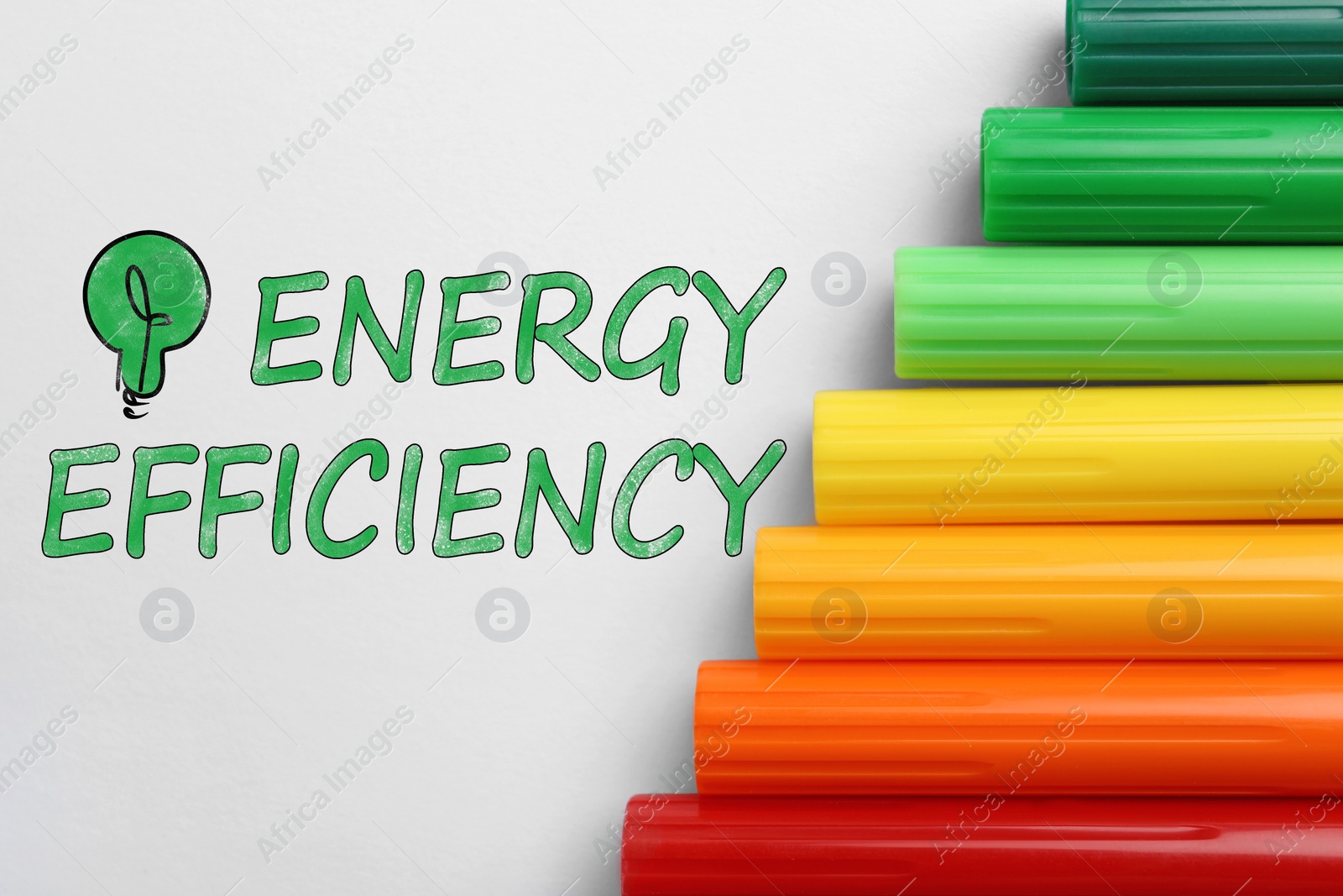 Image of Energy efficiency concept. Colorful markers on white background, flat lay