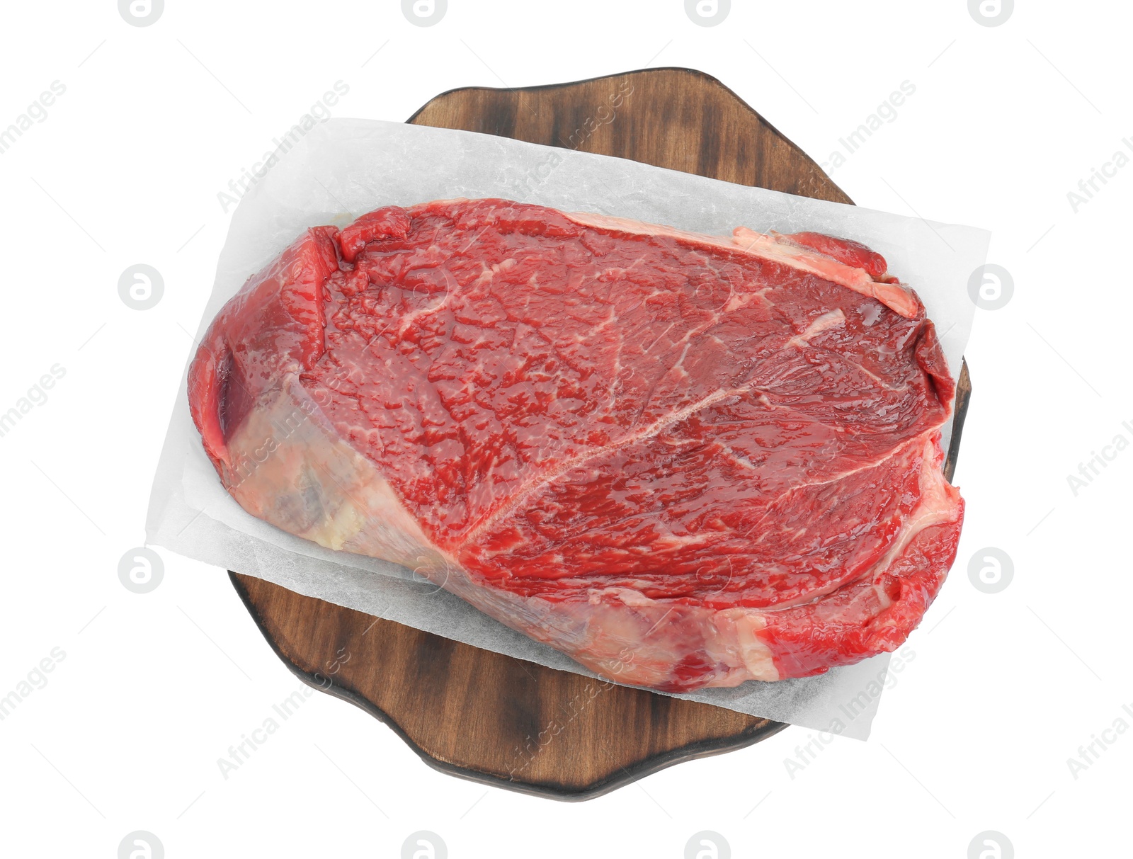 Photo of Wooden board with piece of raw meat isolated on white, top view