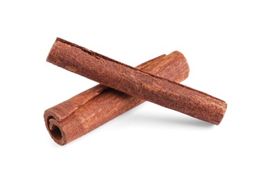 Photo of Two aromatic cinnamon sticks isolated on white