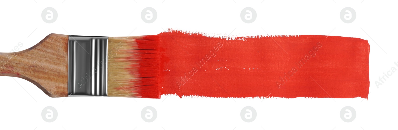 Photo of Red paint stroke and brush on white background, top view