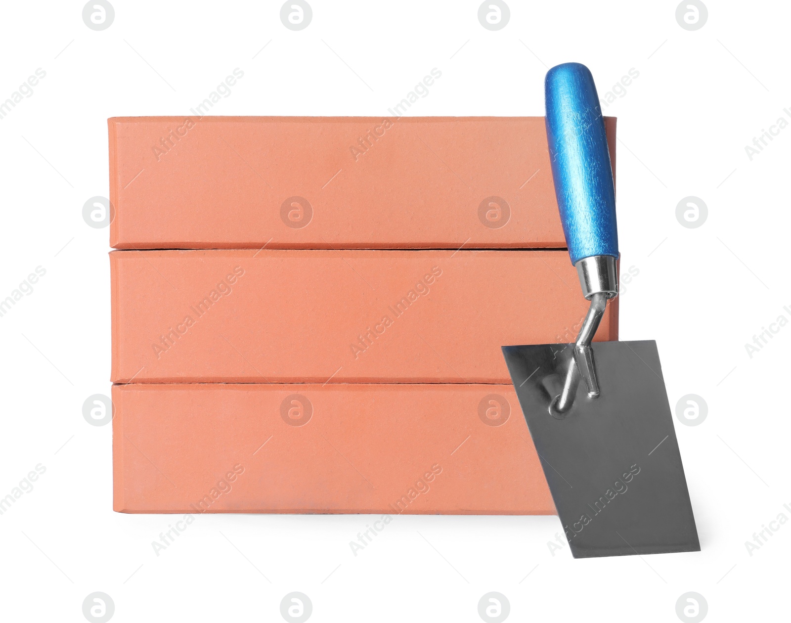 Photo of Red bricks and trowel on white background