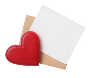 Photo of Blank card, envelope and red decorative heart on white background, top view. Valentine's Day celebration