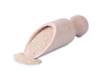 Wooden scoop with active dry yeast isolated on white