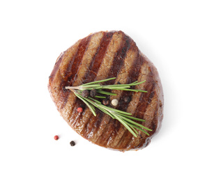 Photo of Delicious grilled beef medallion with rosemary and peppers mix isolated on white, top view