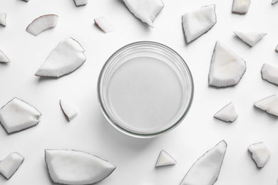 Photo of Composition with coconut oil on white background, top view