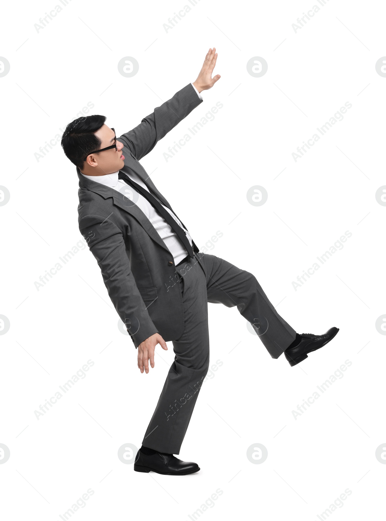 Photo of Businessman in suit posing on white background