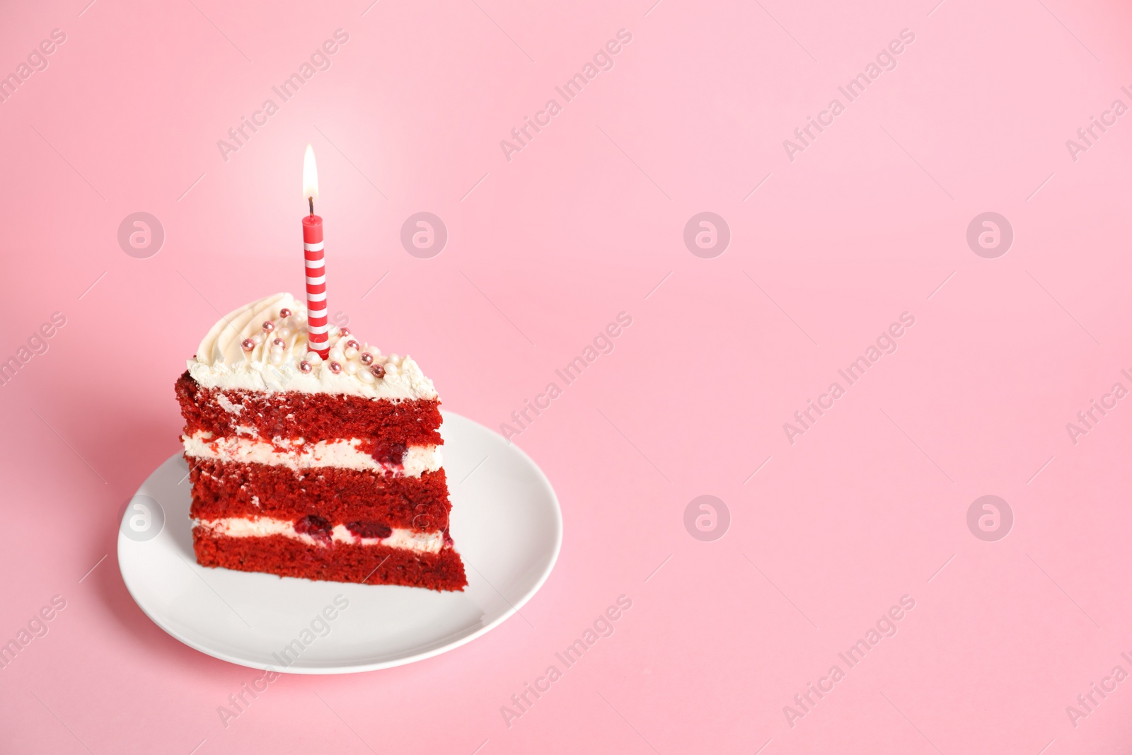 Photo of Plate with piece of delicious homemade red velvet cake and space for text on color background