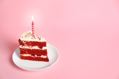 Plate with piece of delicious homemade red velvet cake and space for text on color background