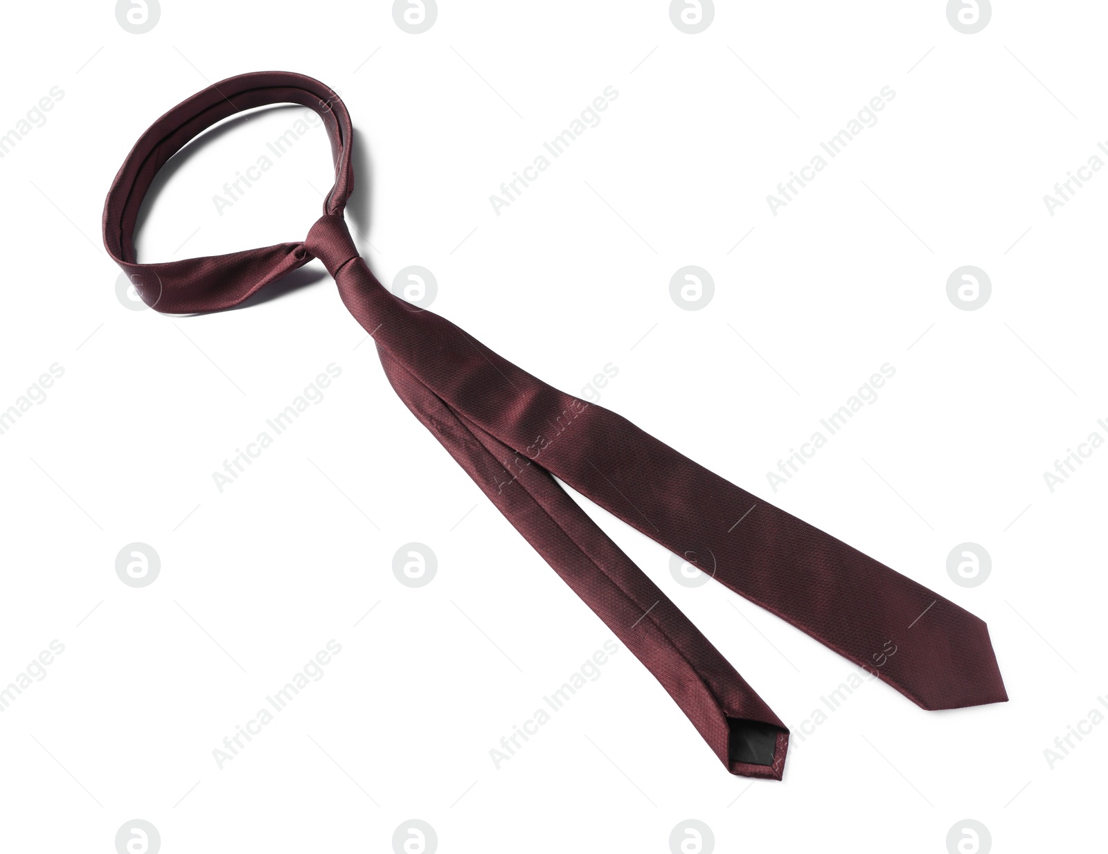 Photo of One brown necktie isolated on white, above view