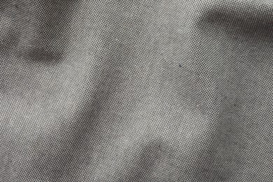 Texture of grey fabric as background, top view