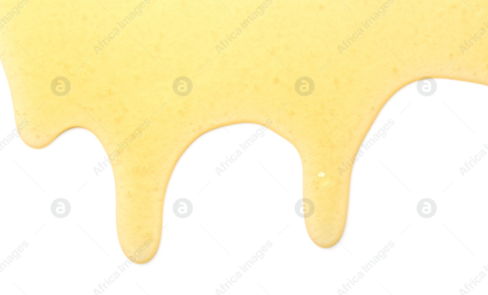 Photo of Tasty natural honey drips isolated on white, top view