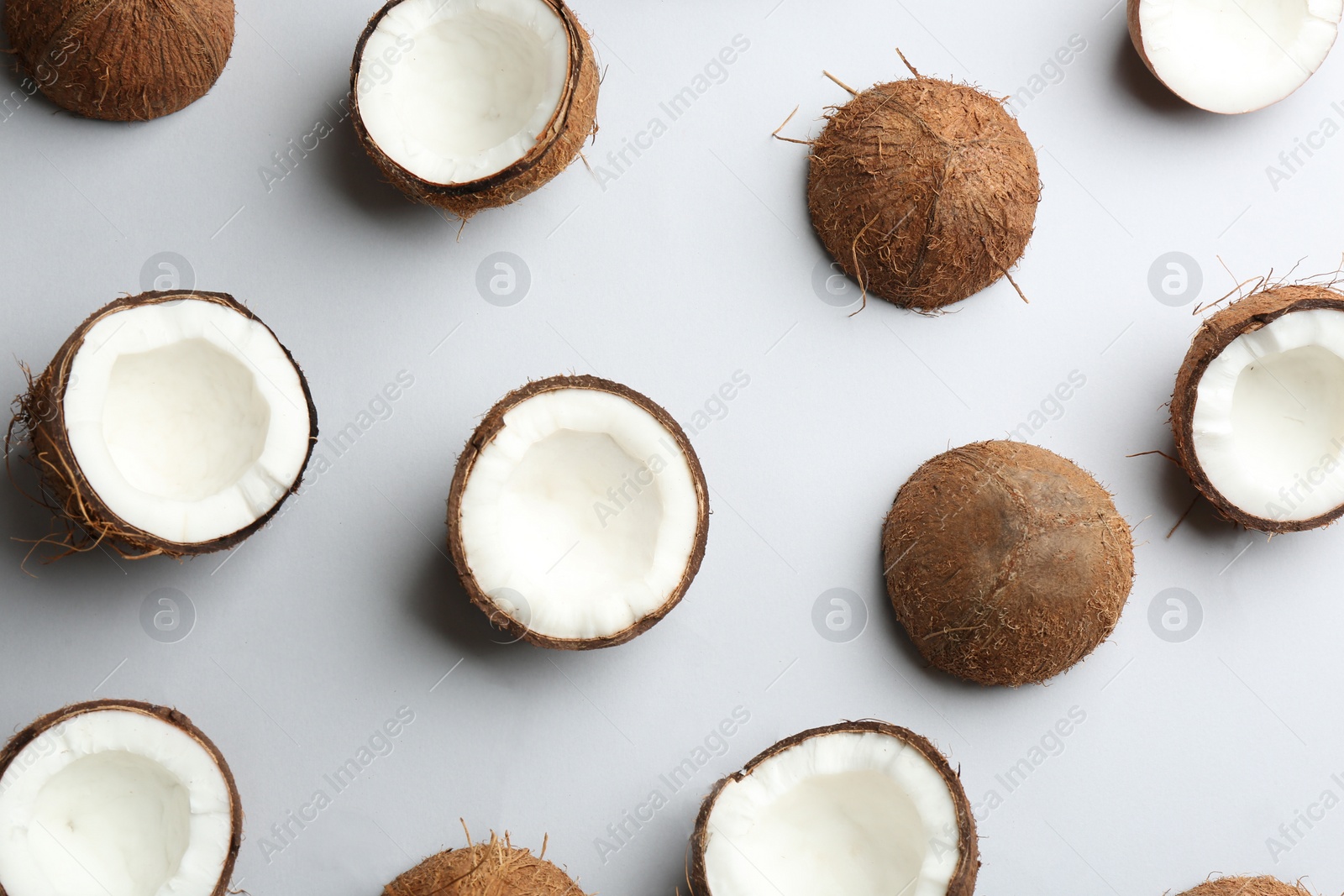 Photo of Coconut pattern on white background, top view