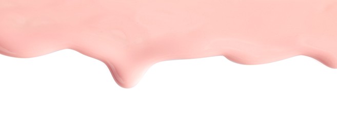 Photo of Light pink nail polish flowing on white background