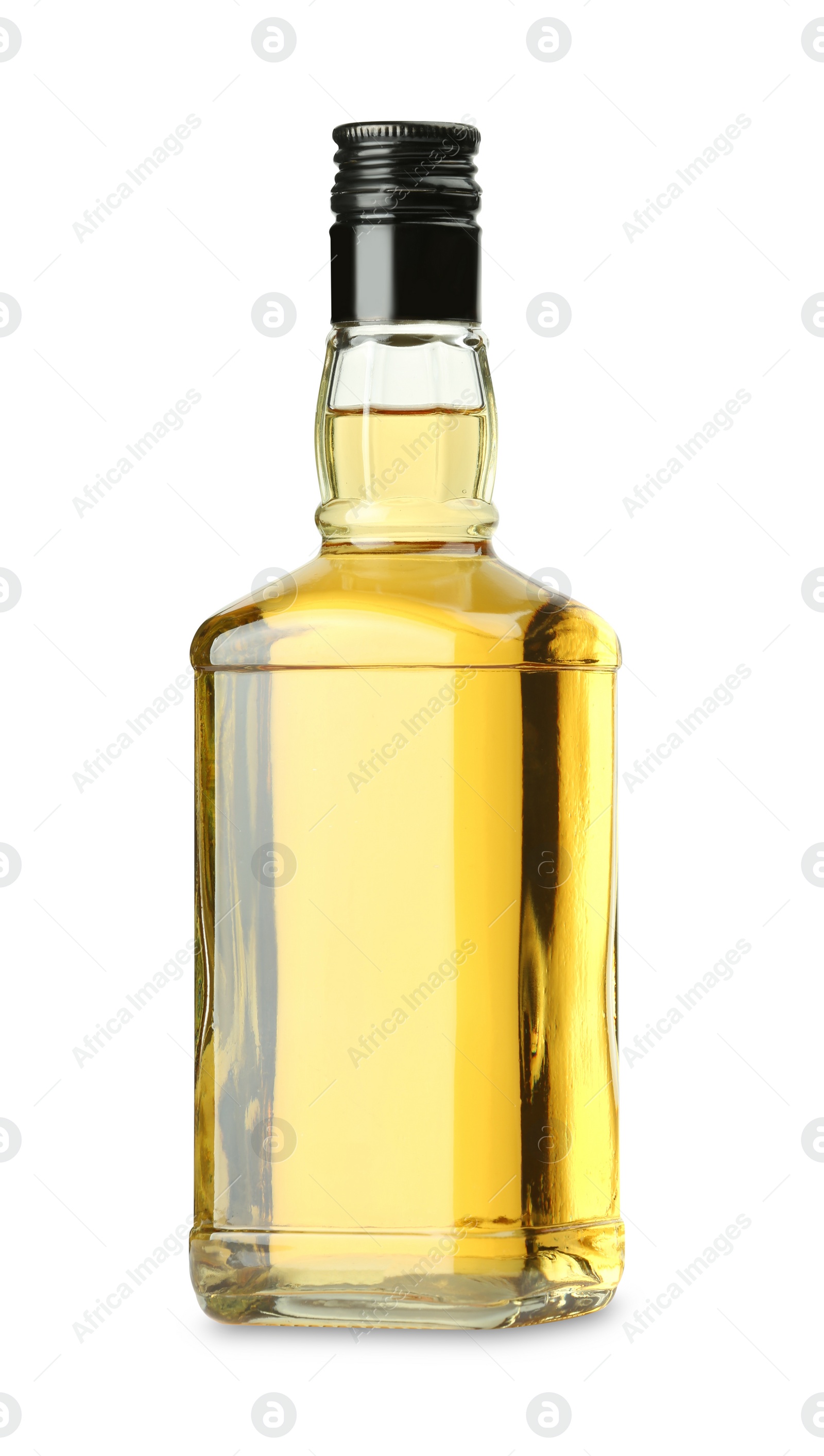 Photo of Whiskey in glass bottle isolated on white