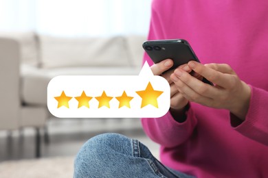 Image of Woman leaving service feedback with smartphone at home, closeup. Stars over device