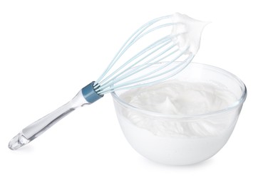 Photo of Bowl with whipped cream and whisk isolated on white