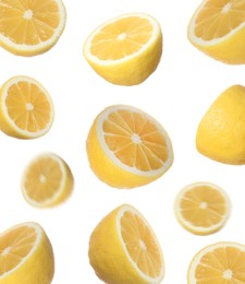 Image of Fresh ripe lemons falling on white background