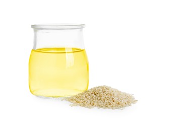 Photo of Glass jar with fresh sesame oil and seeds isolated on white