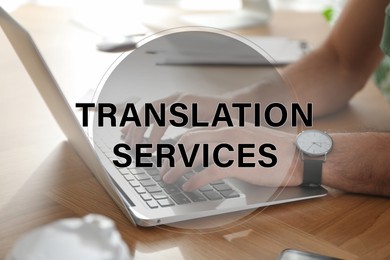 Image of Translation services. Man working on laptop at table indoors, closeup