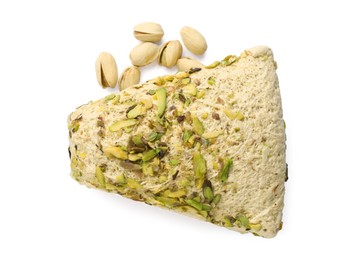 Photo of Piece of tasty halva with pistachios isolated on white, top view