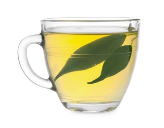 Photo of Fresh green tea in glass cup and leaves isolated on white