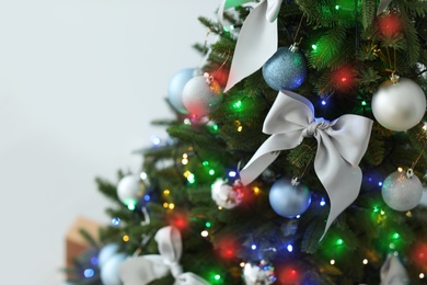 Photo of Beautifully decorated Christmas tree, closeup