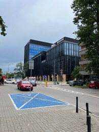 Photo of WARSAW, POLAND - JULY 11, 2022: Beautiful view of modern office building and traffic