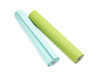Photo of Two colorful wallpaper rolls isolated on white