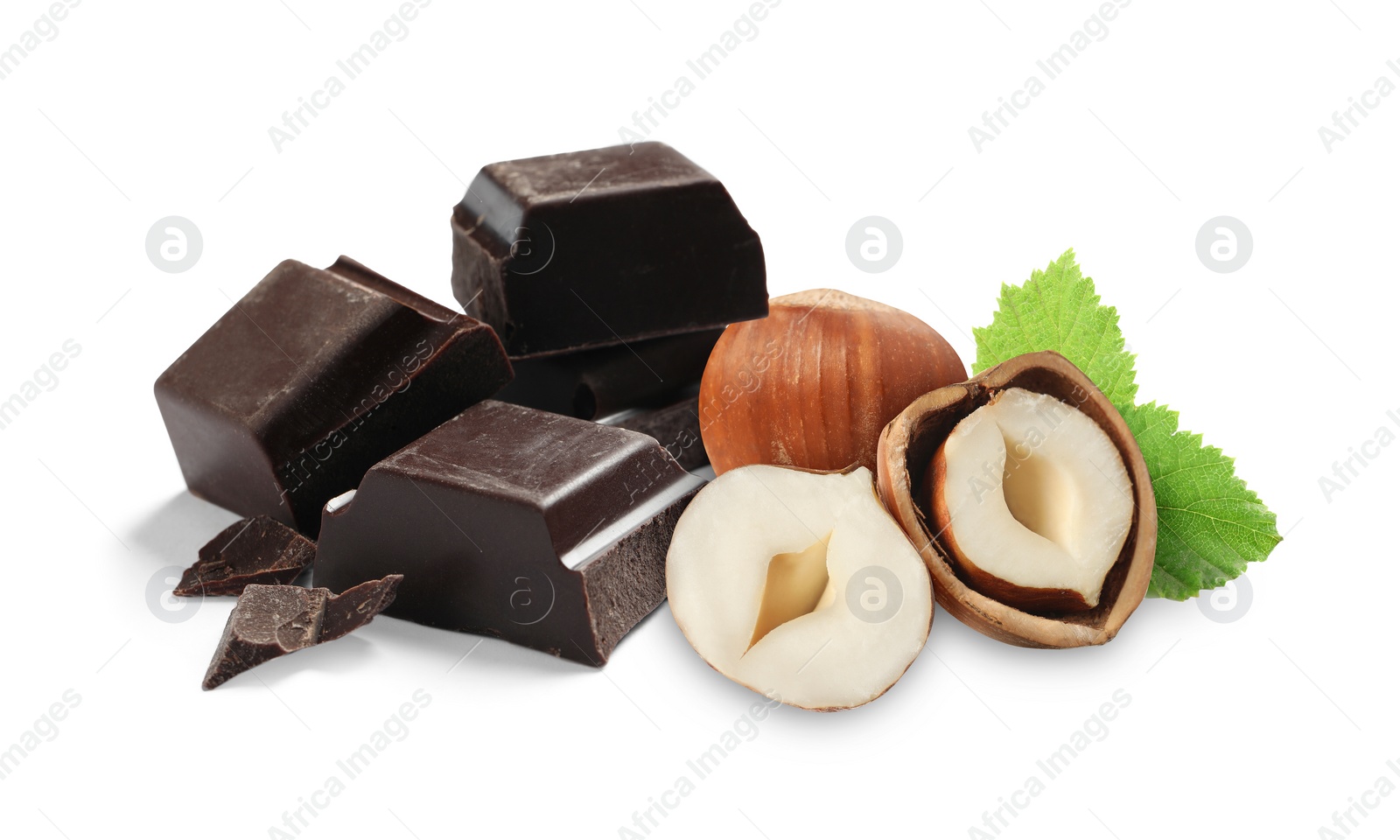 Image of Dark chocolate and hazelnuts isolated on white