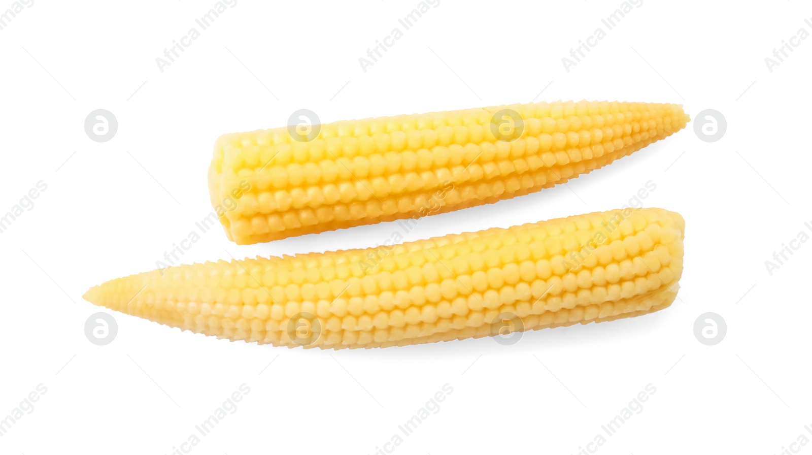 Photo of Pickled baby corn isolated on white, top view