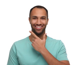 Photo of Portrait of smiling man with healthy clean teeth on white background