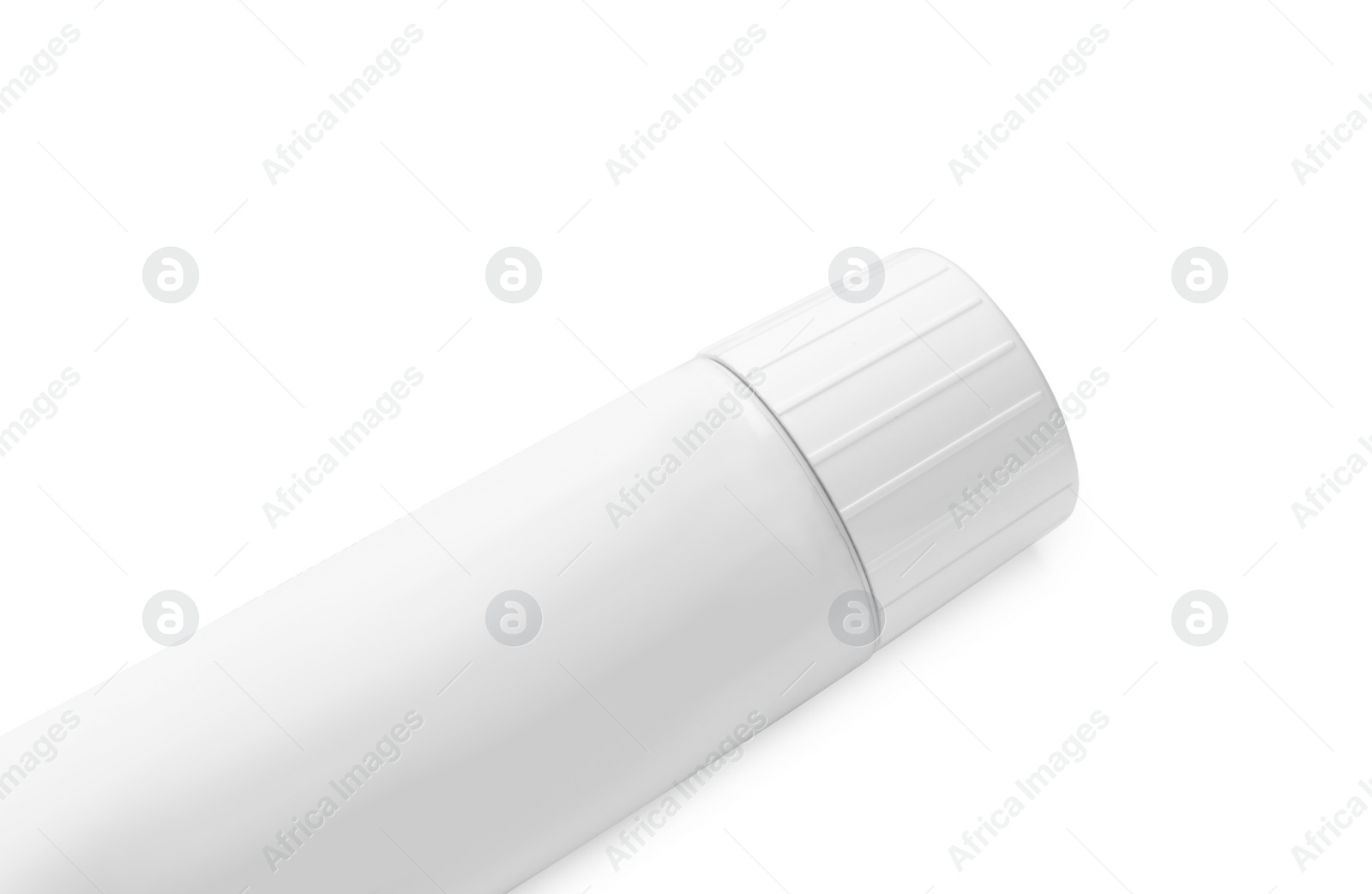 Photo of Tube of ointment isolated on white, top view. Space for text