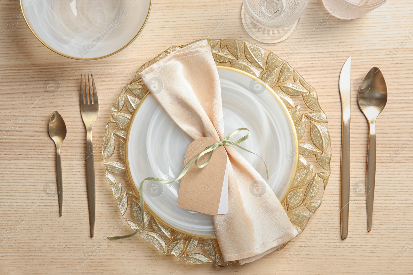 Photo of Elegant table setting on wooden background, top view