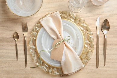 Photo of Elegant table setting on wooden background, top view