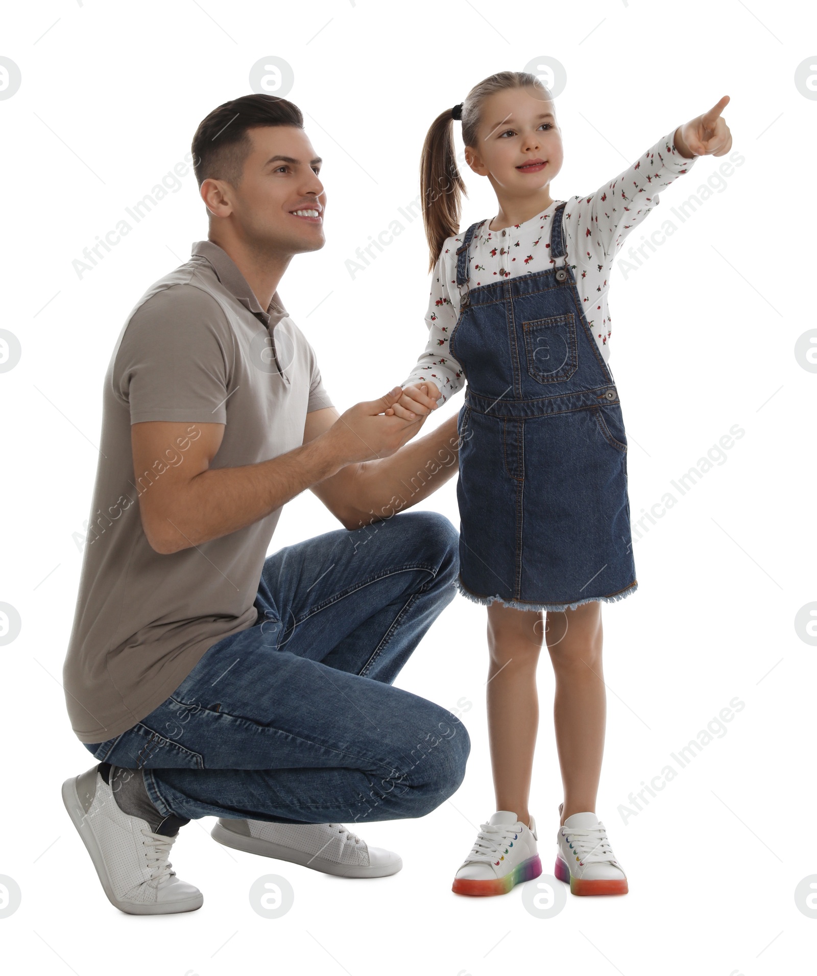 Photo of Little girl with her father on white background