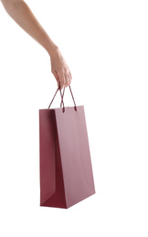 Photo of Woman with paper shopping bag on white background, closeup