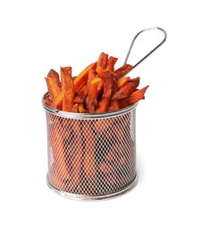 Photo of Delicious sweet potato fries in frying basket isolated on white