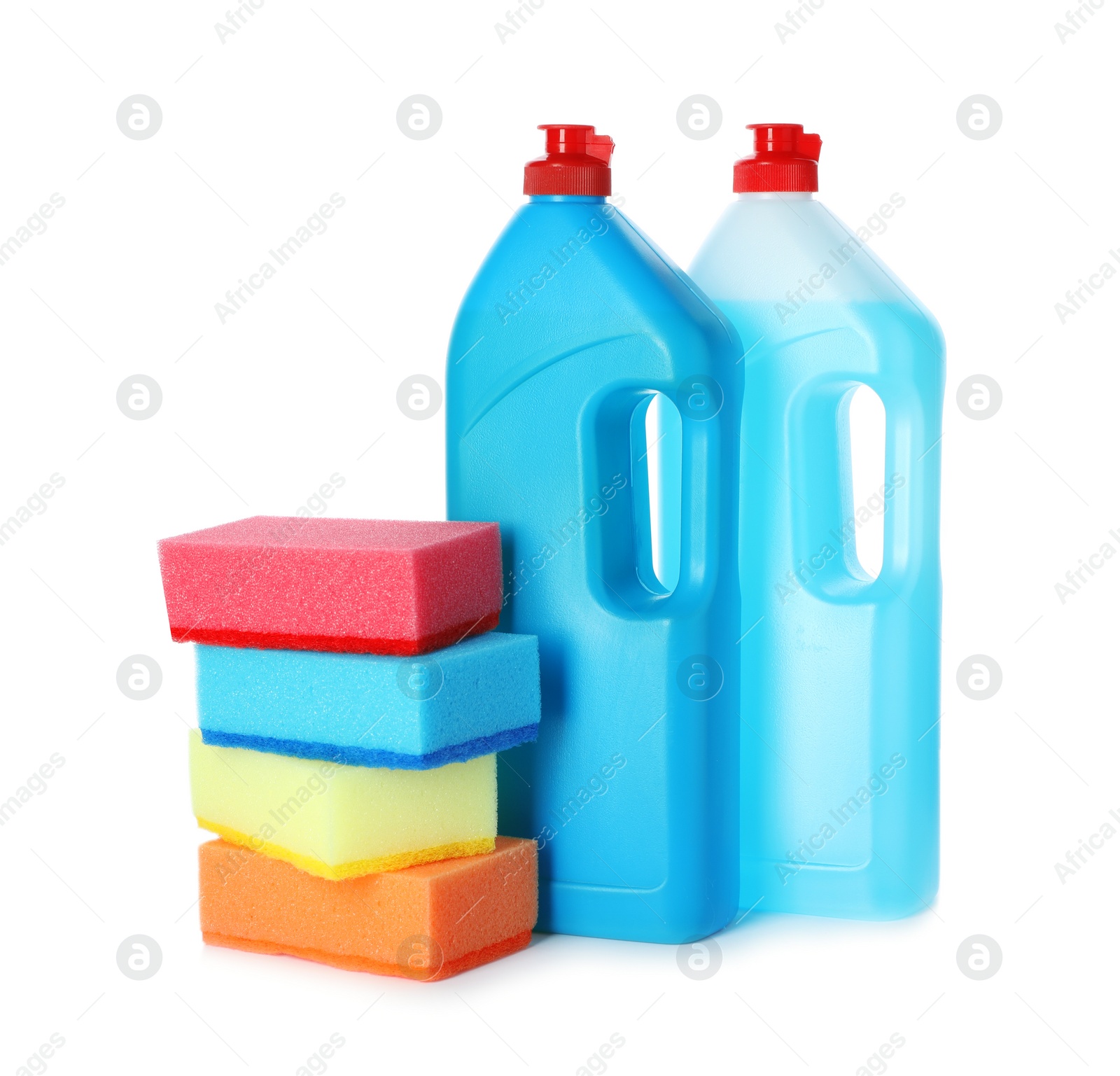 Photo of Cleaning products and sponges for dish washing on white background