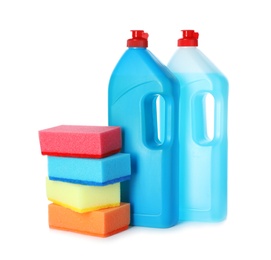 Cleaning products and sponges for dish washing on white background