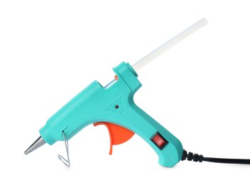 Photo of Turquoise glue gun with stick isolated on white