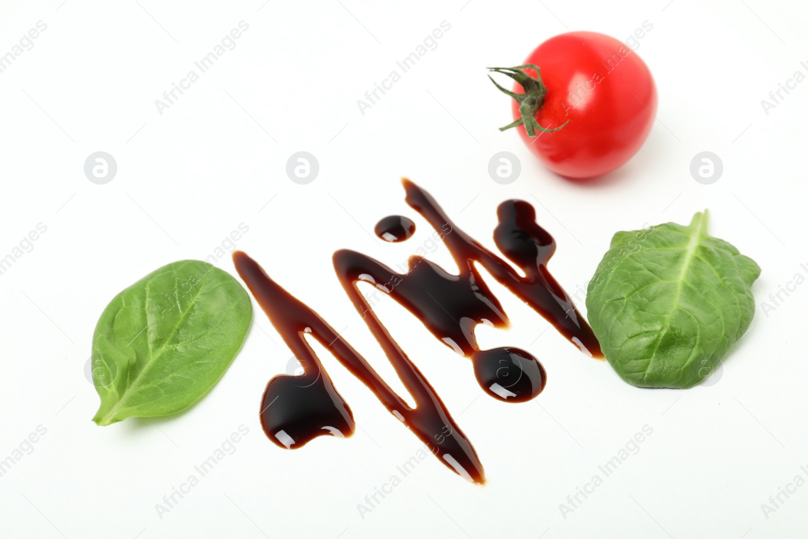 Photo of Composition with balsamic vinegar isolated on white