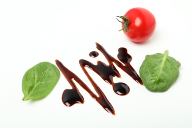 Photo of Composition with balsamic vinegar isolated on white