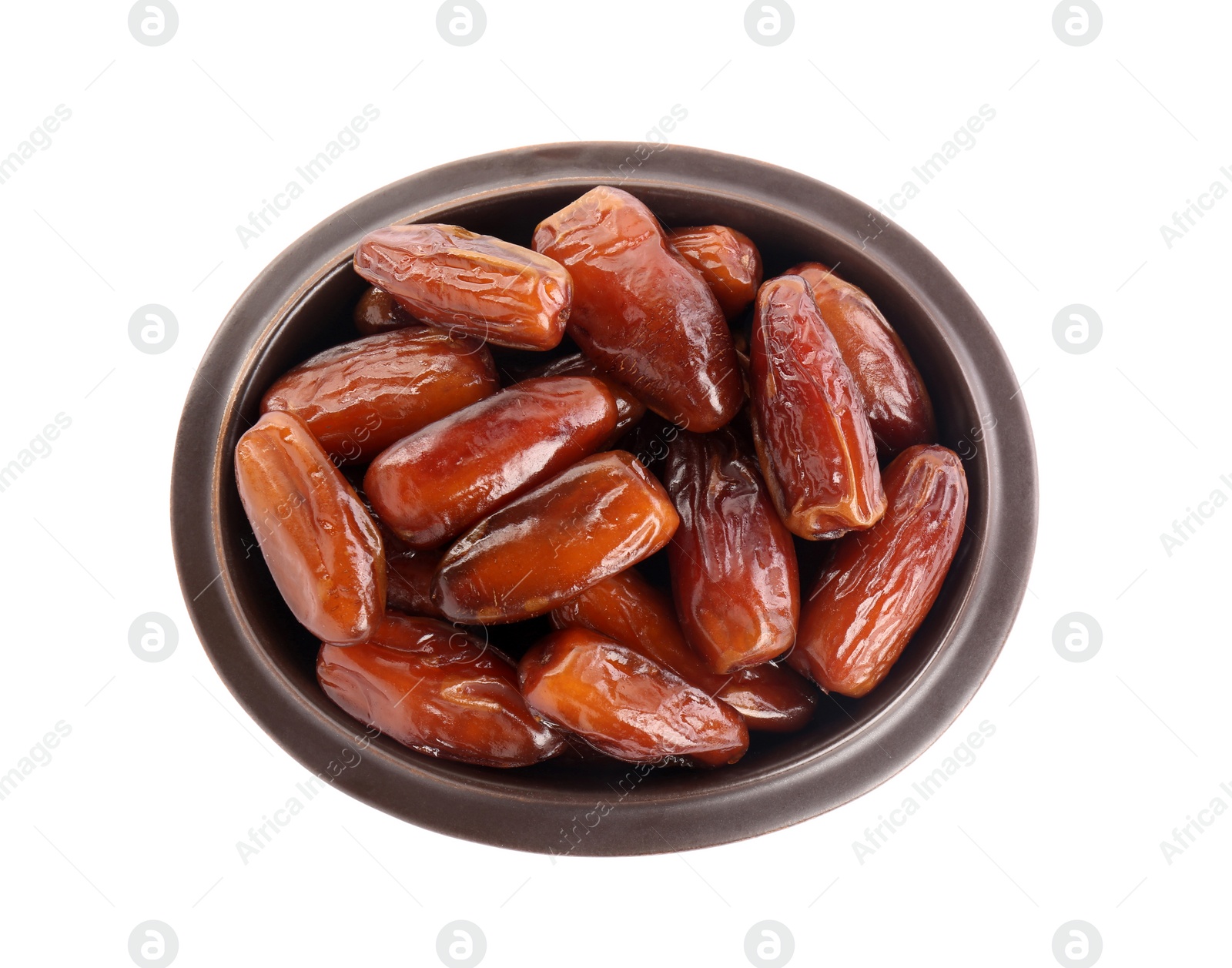 Photo of Sweet dried dates in bowl on white background, top view