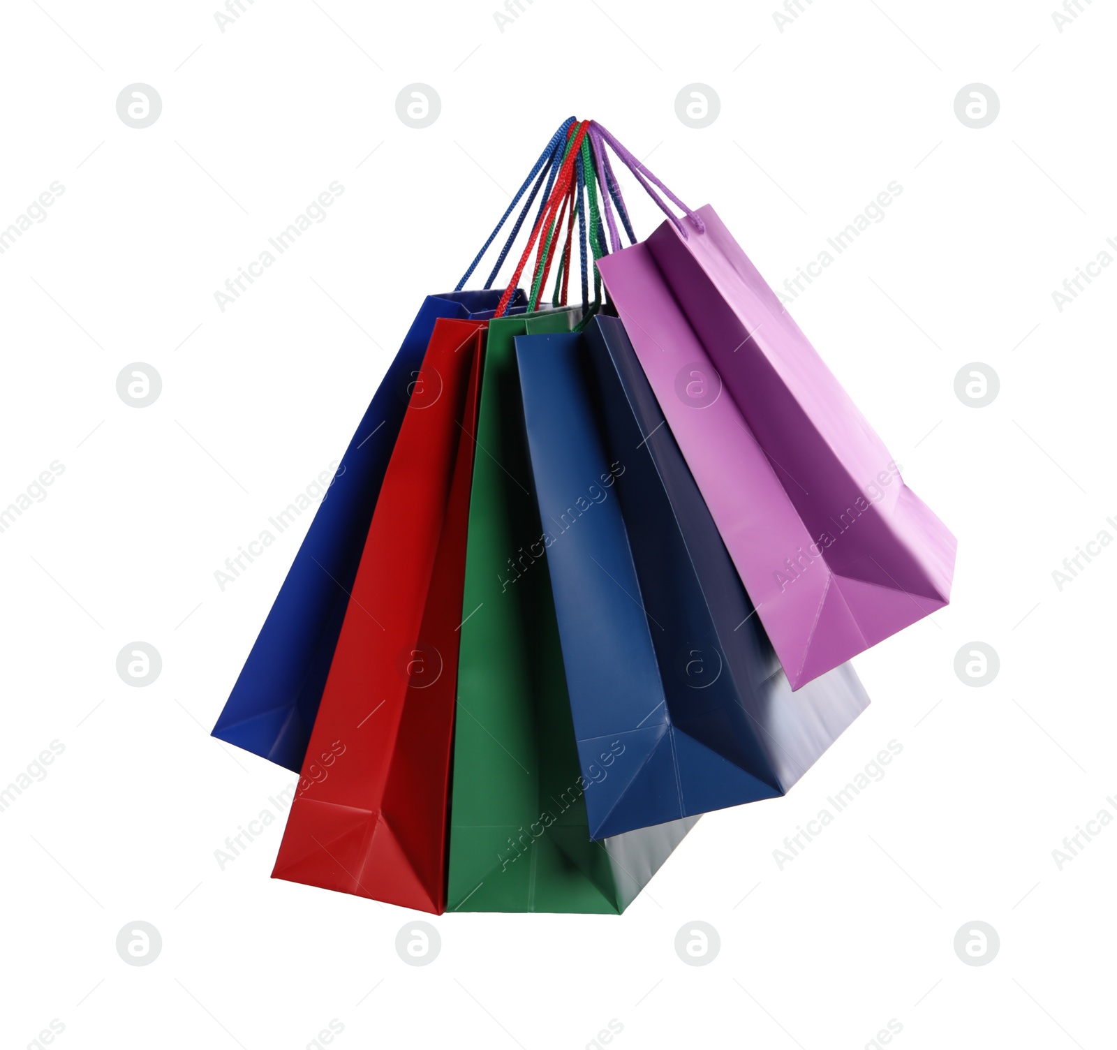 Photo of Colorful paper shopping bags isolated on white