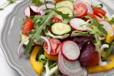 Photo of Balanced diet and vegetarian foods. Plate with different delicious products on table, closeup